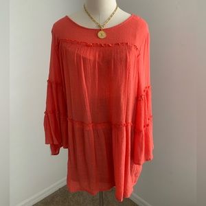 Billowing loose, long sleeve blouse.